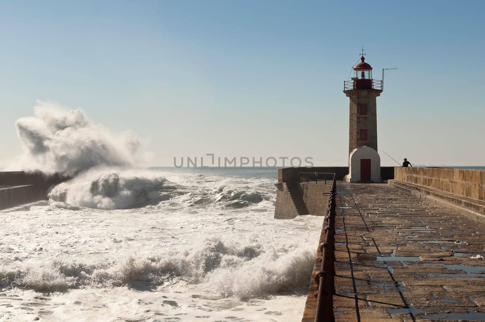 Historic lighthouse of Felgueiras in the river mouth of Douro, Porto, Portugal