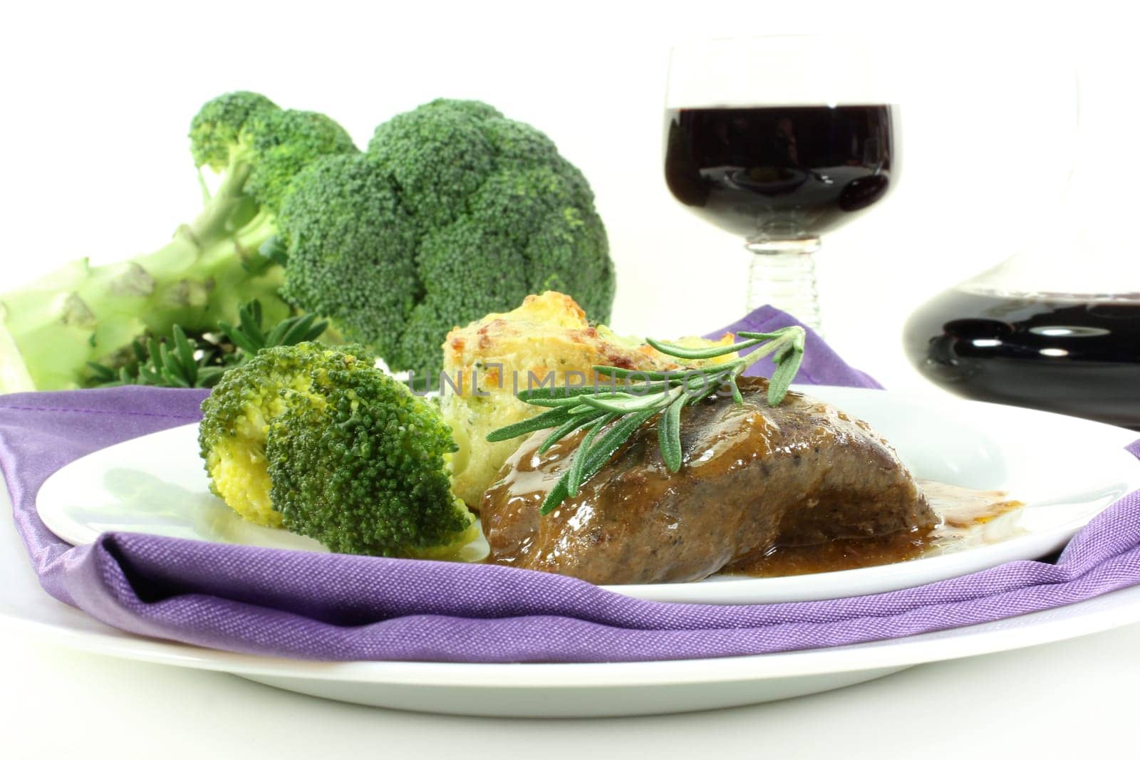 Venison steak with broccoli and potato gratin