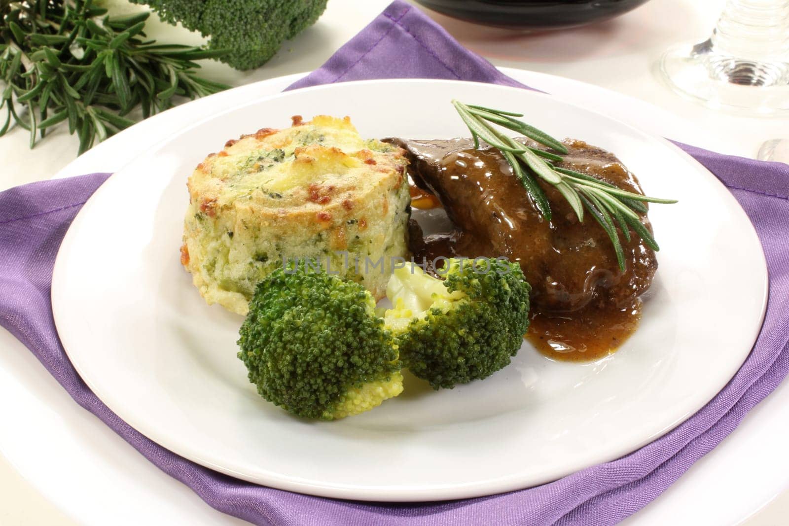 Venison steak with broccoli and potato gratin