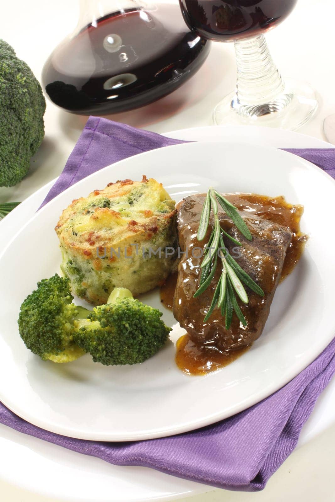 Venison steak with broccoli and potato gratin