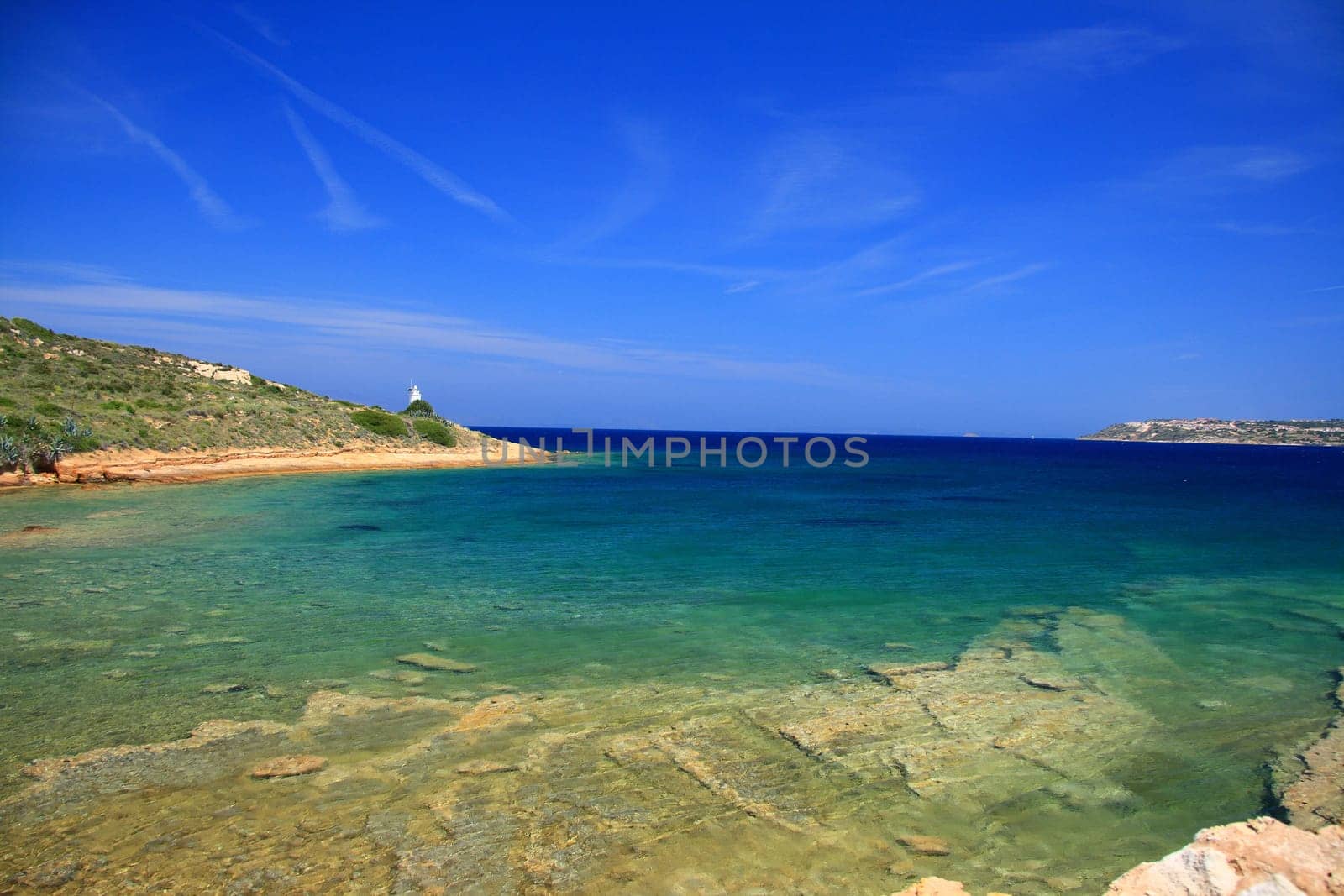 sea view from izmir with lighthouse under blue sky