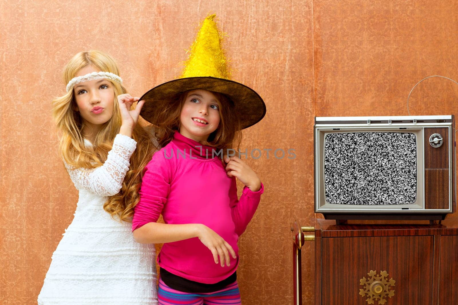 children 70s two kid friend girls in party with retro wood tv
