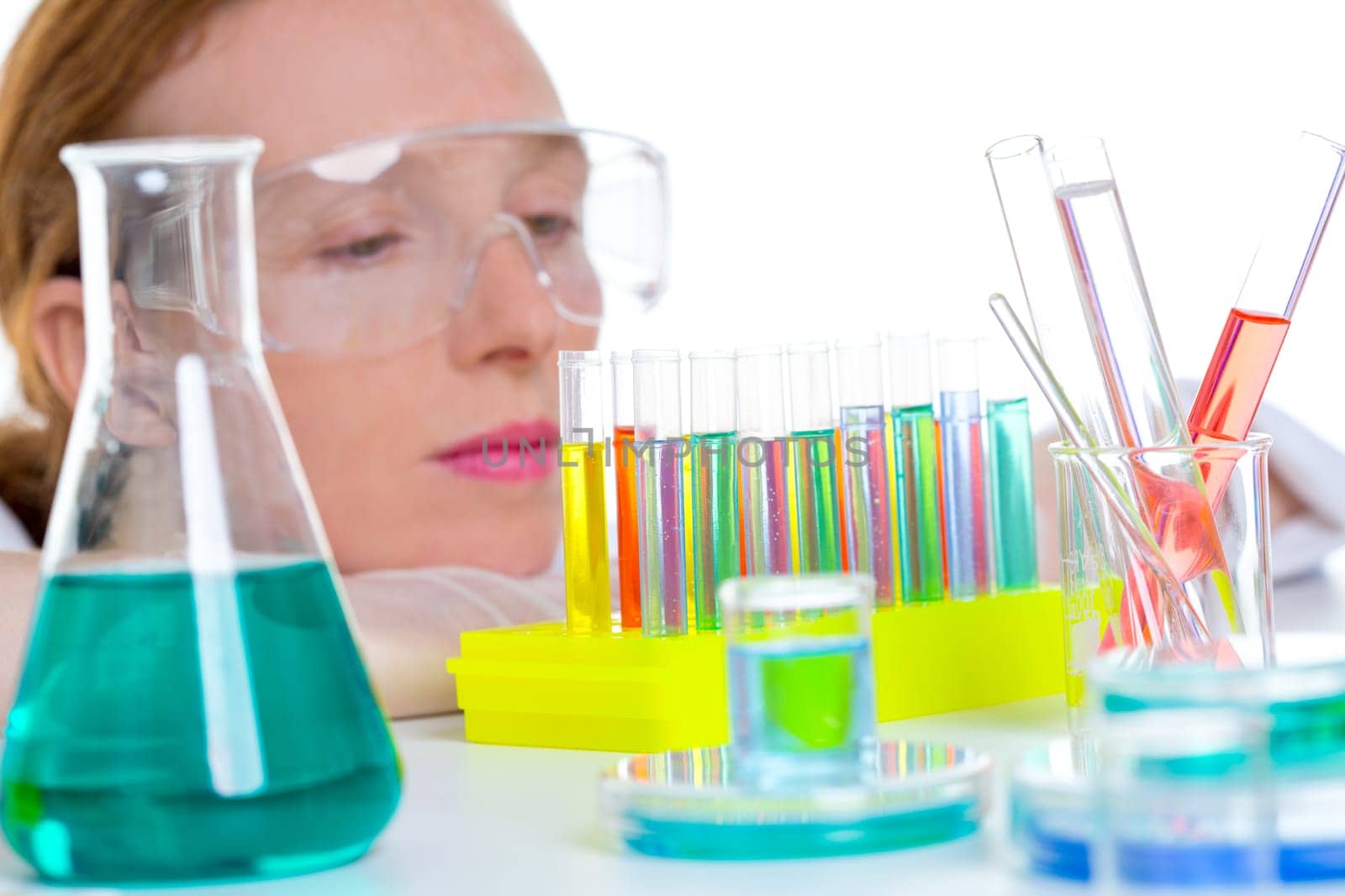 chemical laboratory scientist woman working with test tubes