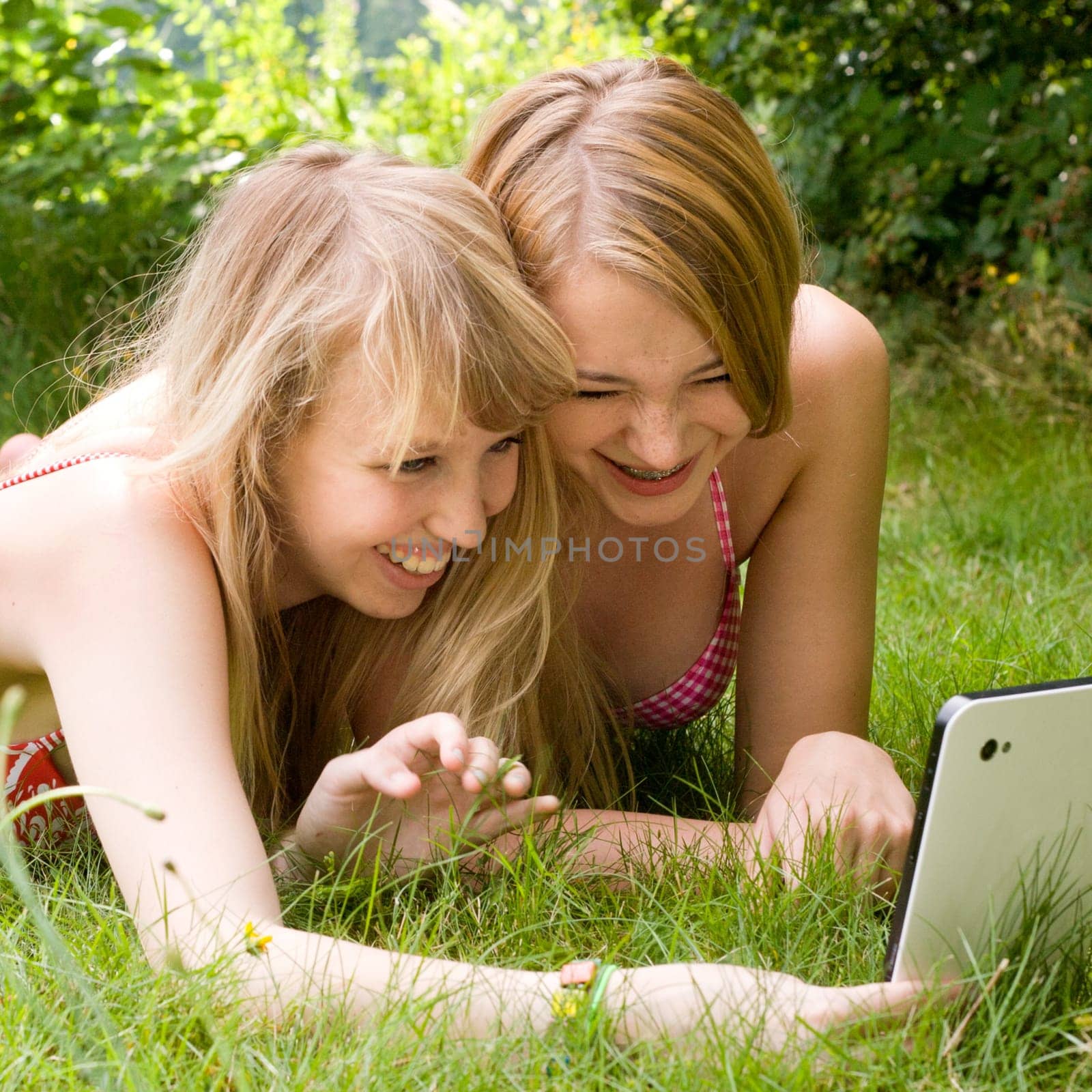 Two girls are having fun in the summer sun
