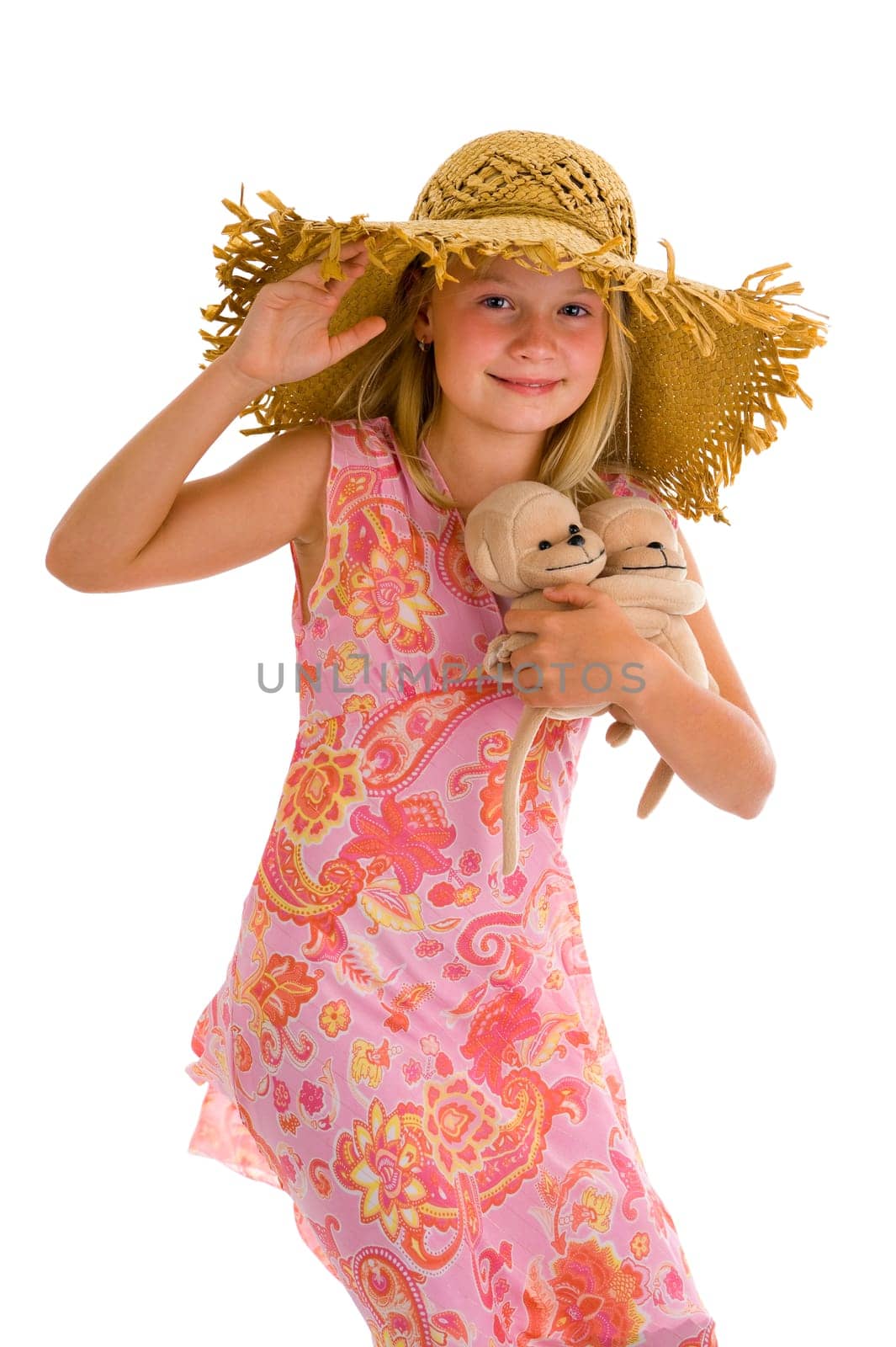cute little girl with cuddlies and summer hat, isolated on white
