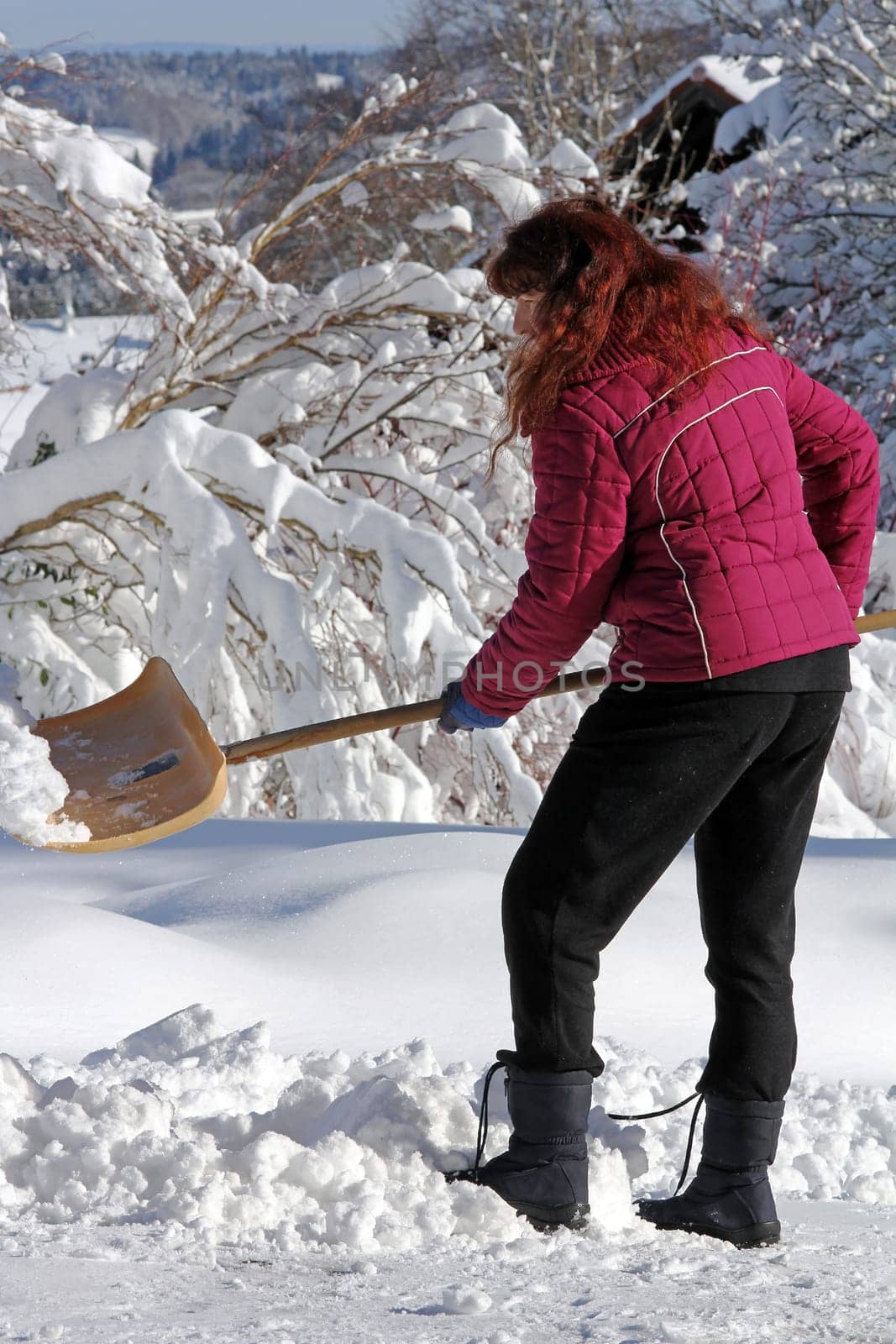Clearing snow after heavy snowfall