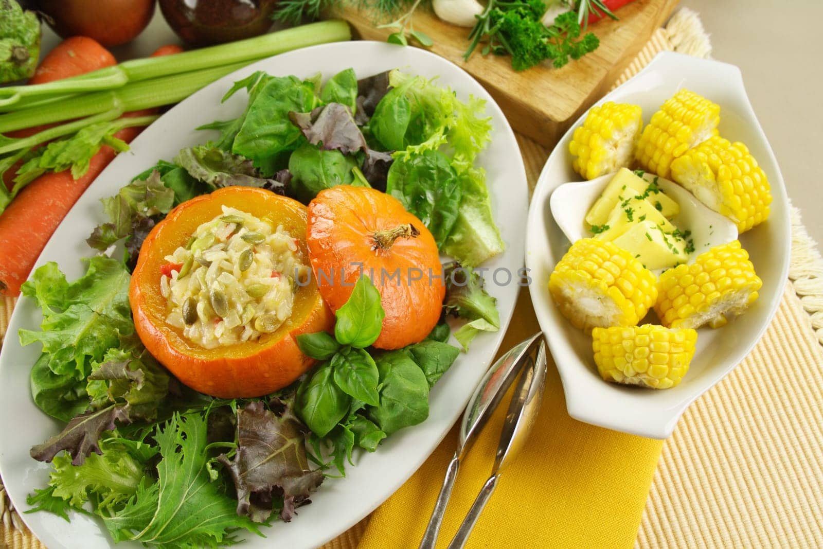 Fresh vegetables with baked golden nugget pumpkin with rice stuffing and corn.