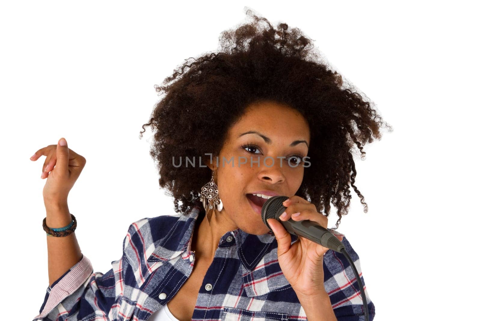 Pretty dark-skinned woman with microphone isolated on white background