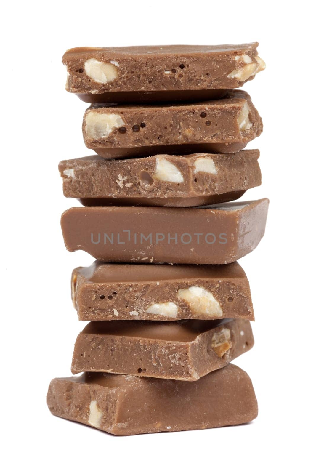 Chocolate,close-up of chocolate pieces against white background