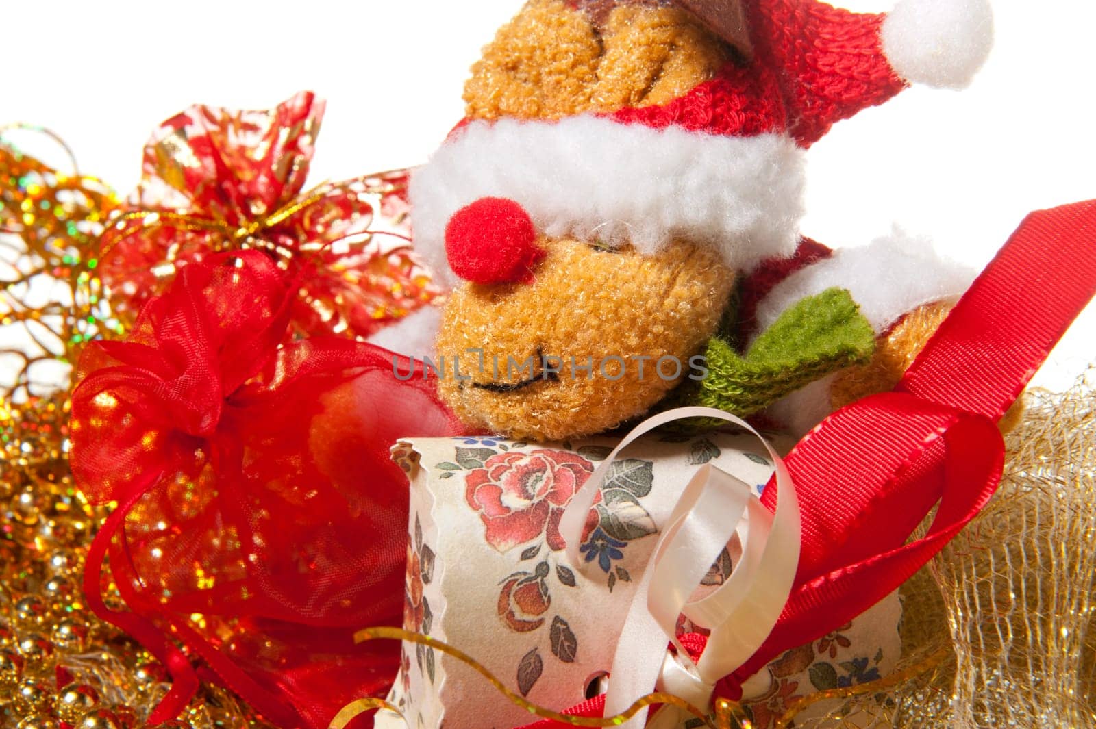 Santa Claus doll an christmas gift on a white background