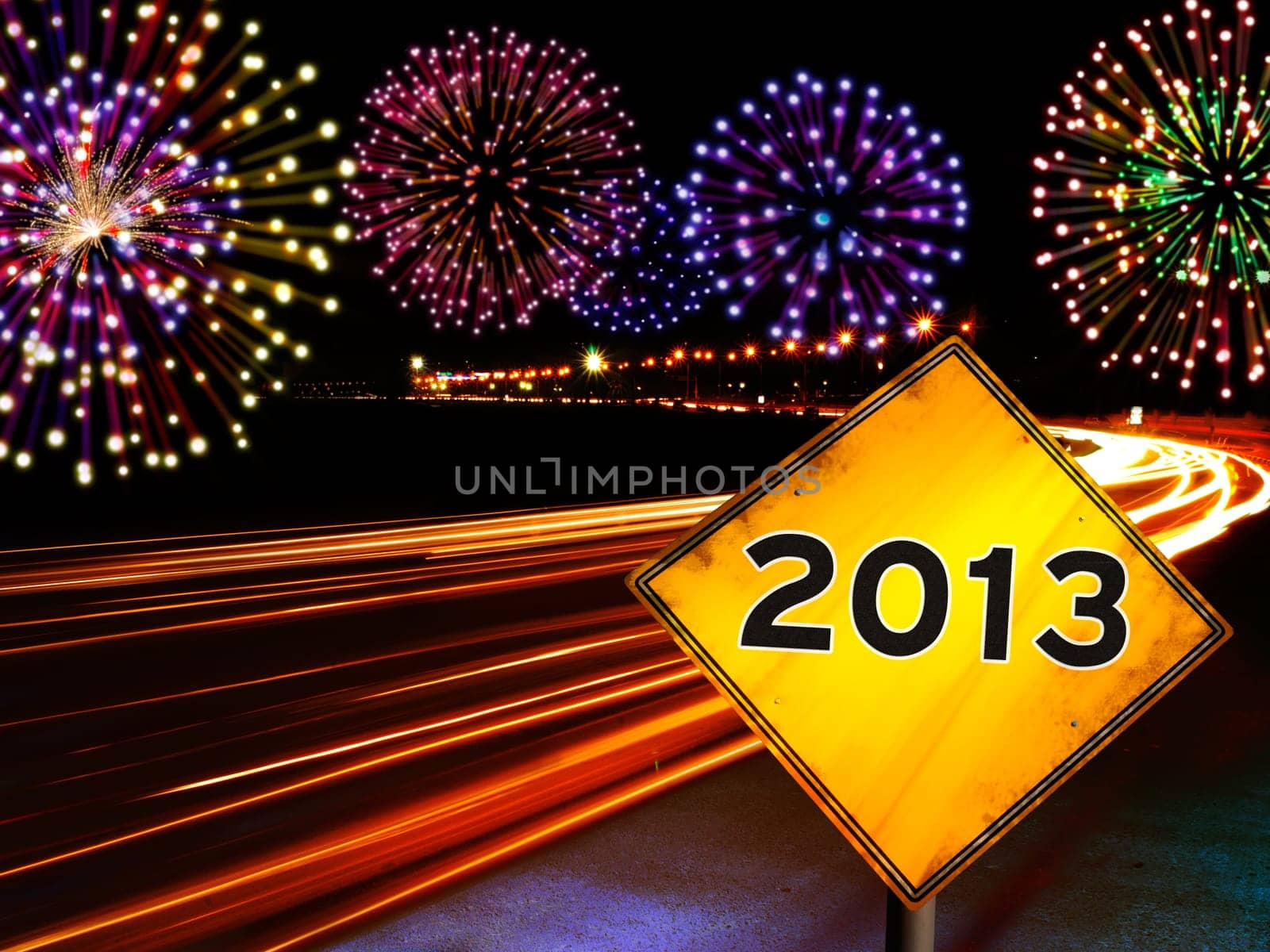 Happy New Year fireworks highway with 2013 year in yellow road sign ahead.