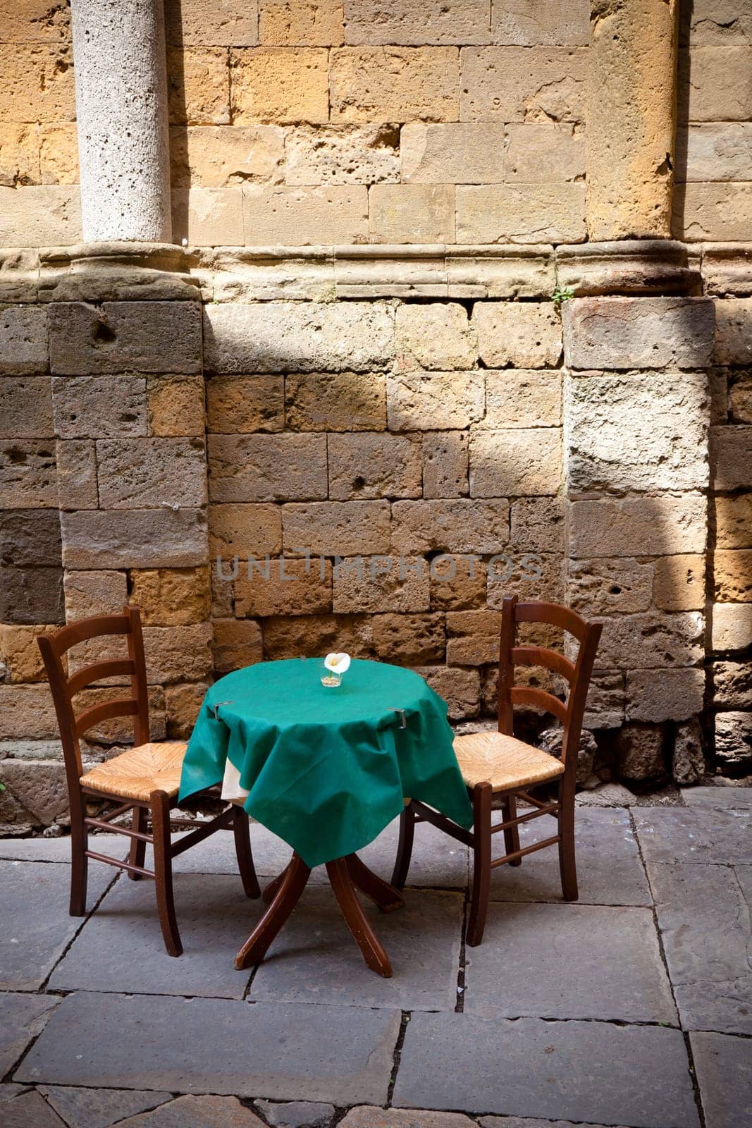 table for two near ancient wall