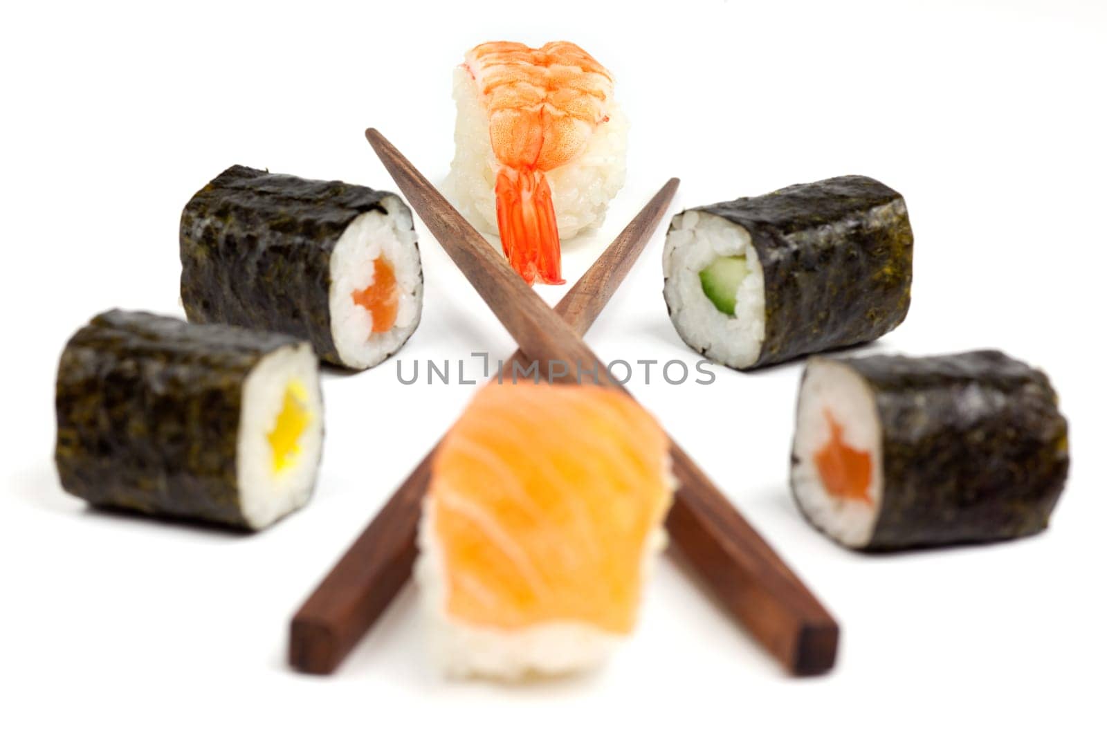 Sushi with chopsticks,Japanese food against white background