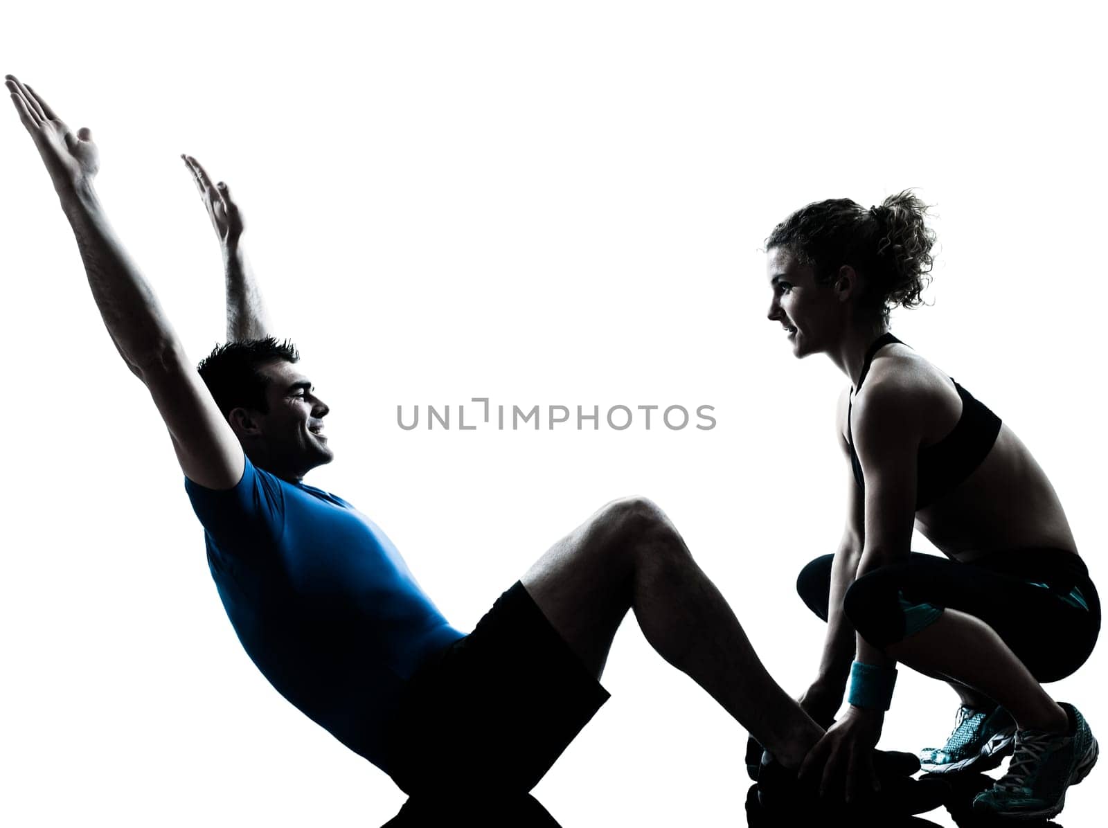 one caucasian couple man woman personal trainer coach exercising abdominal silhouette studio isolated on white background