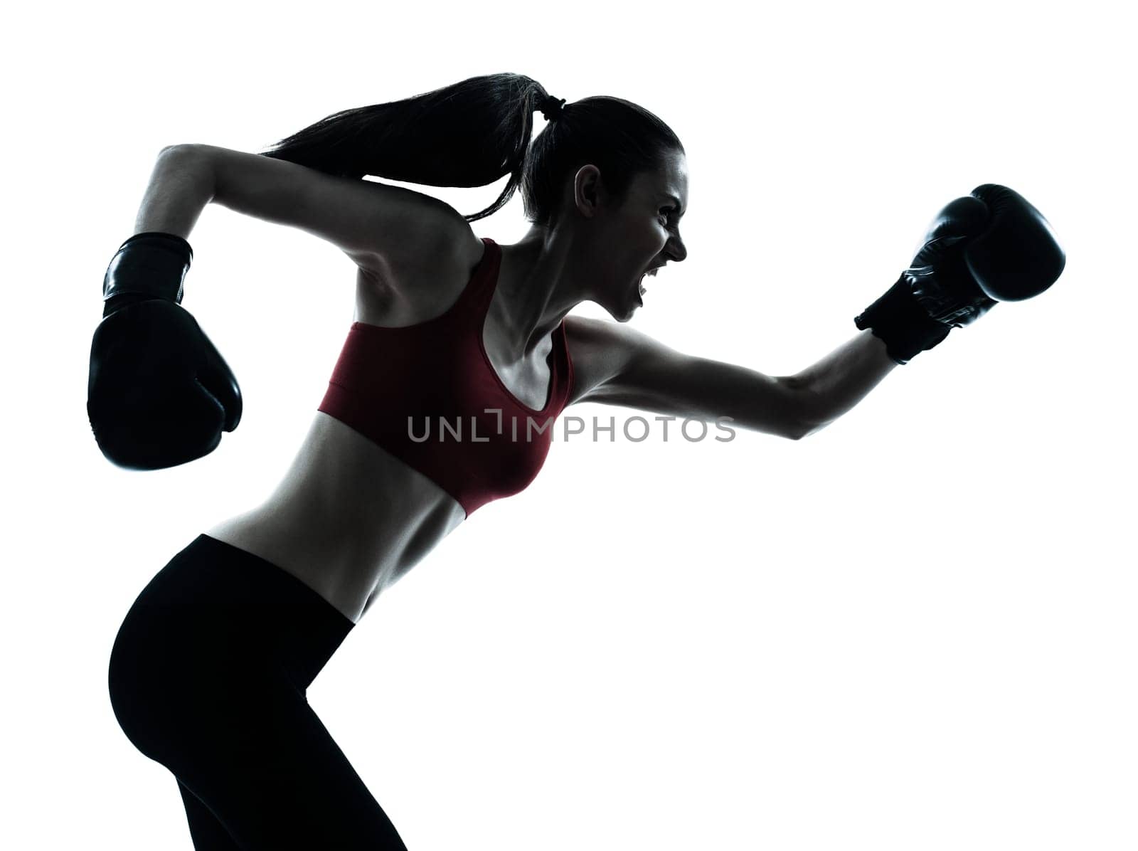 one caucasian woman boxing exercising in silhouette studio  isolated on white background