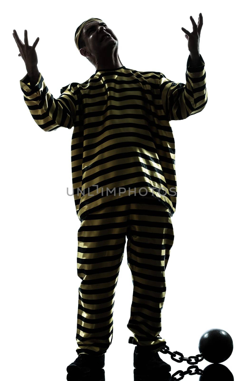 one caucasian man prisoner criminal with chain ball in studio isolated on white background