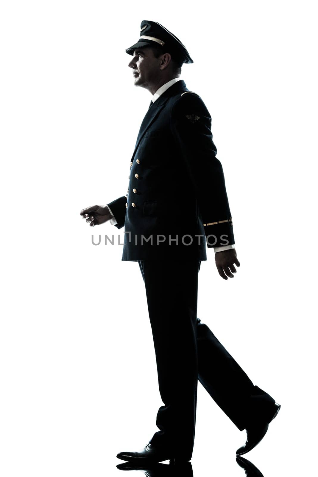 one caucasian man in airline pilot uniform  in studio isolated on white background