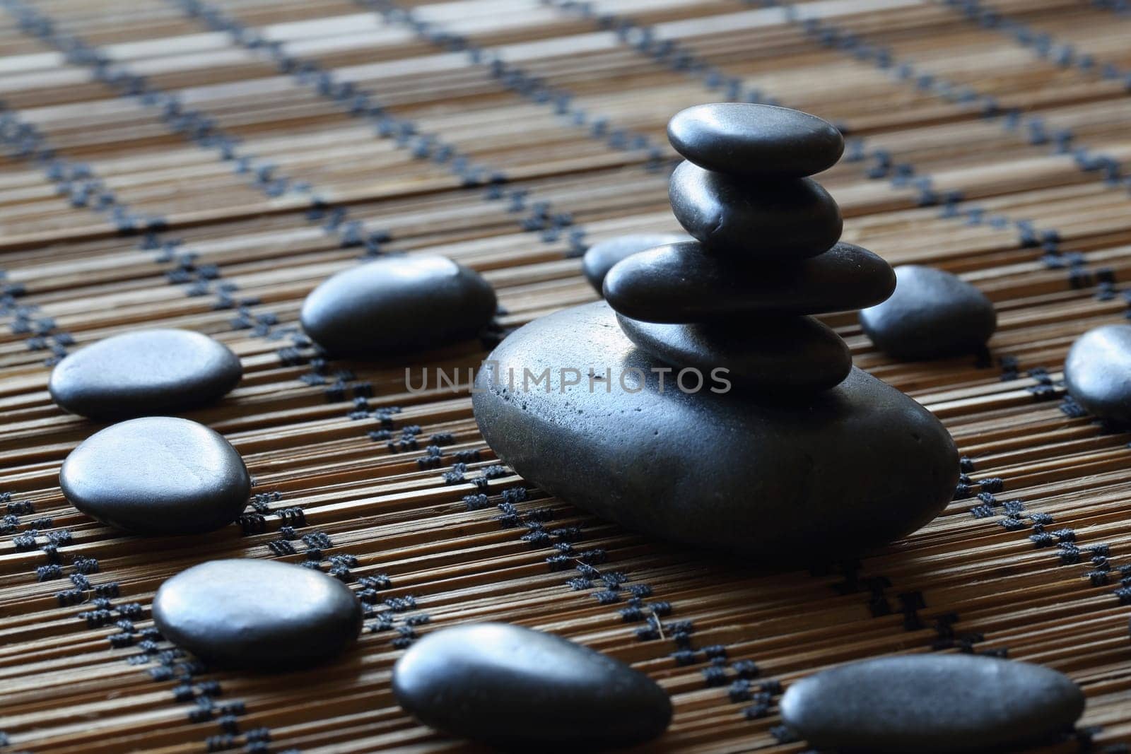details of a tranquil scene, made with a stack of black pebbles.