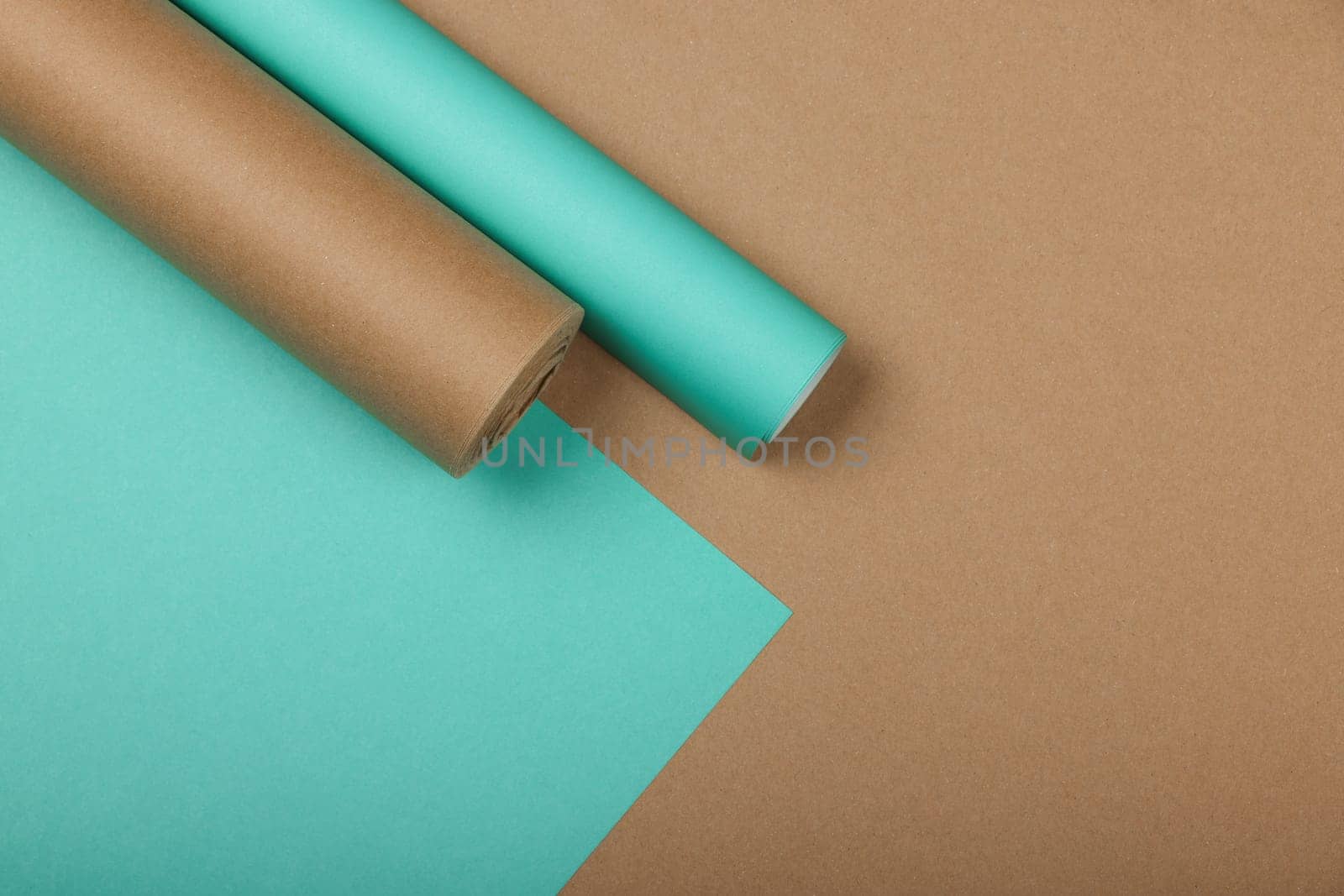 Packing Christmas gifts with blue and brown paper by BreakingTheWalls