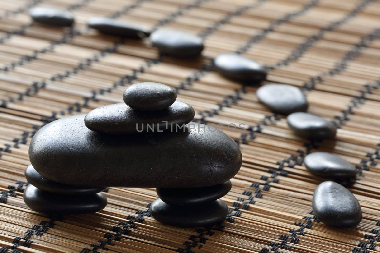 details of a tranquil scene, made withe stack of black pebbles.