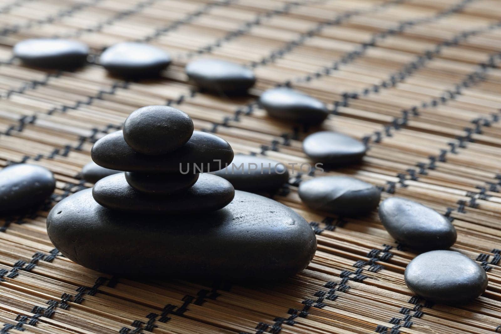 details of a tranquil scene, made withe stack of black pebbles.