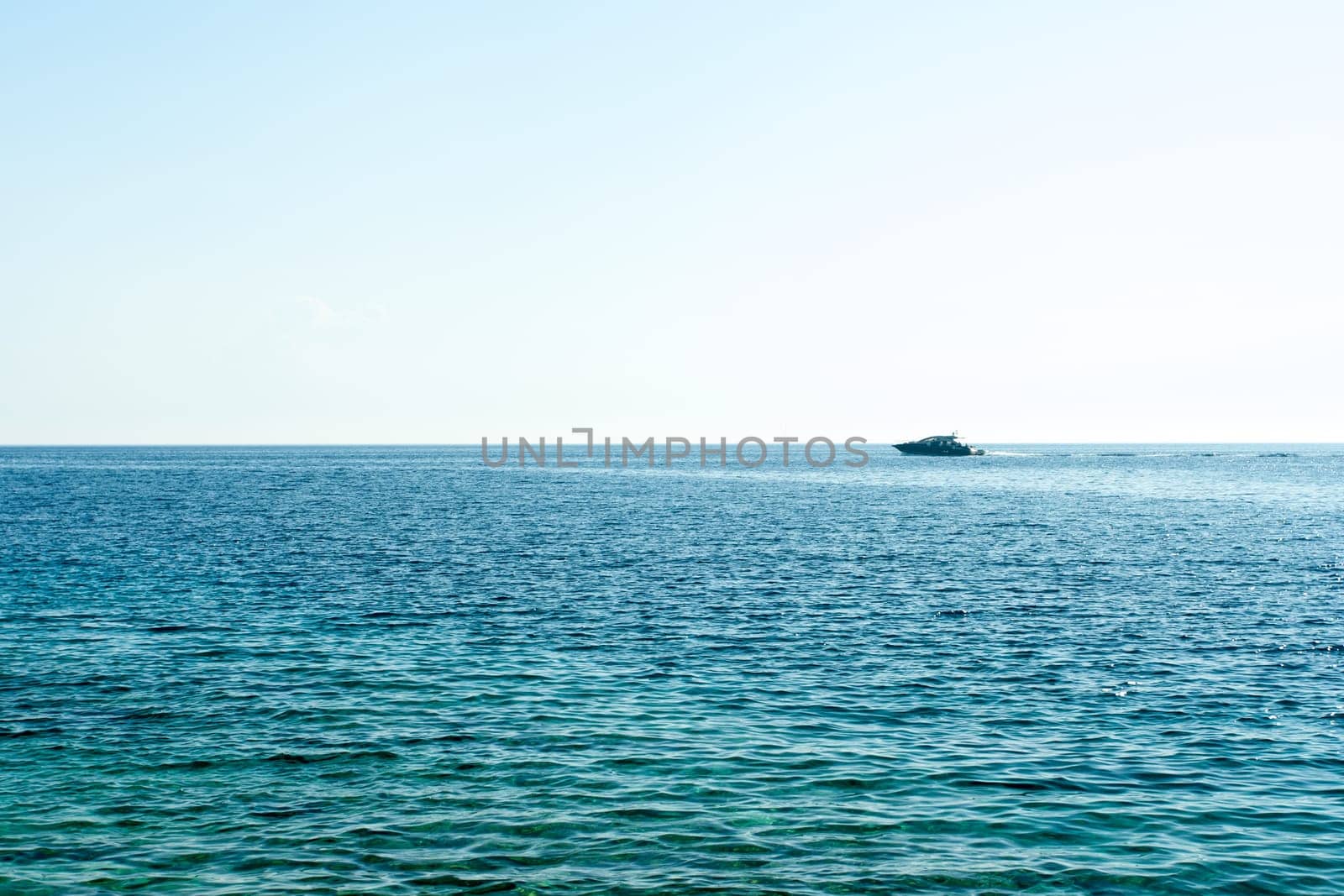 One yacht on open water