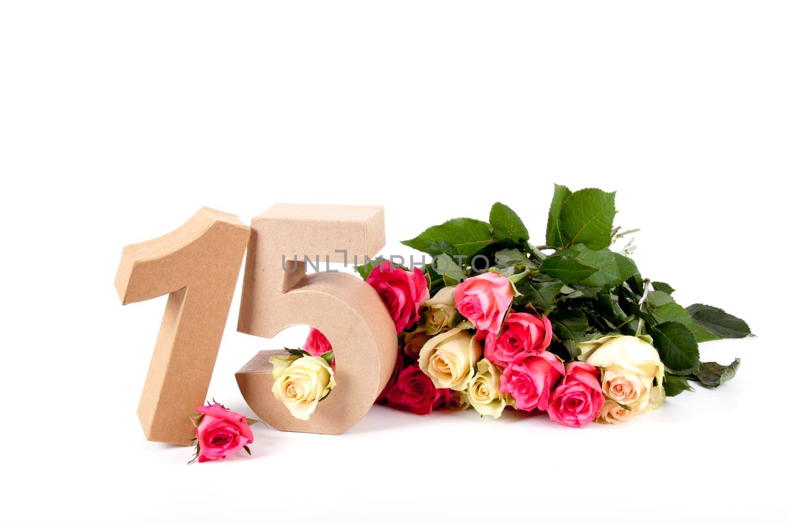 Number of age in a colorful studiosetting,surrounded with roses