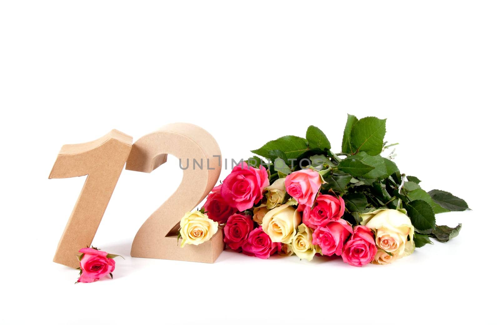 Number of age in a colorful studiosetting,surrounded with roses