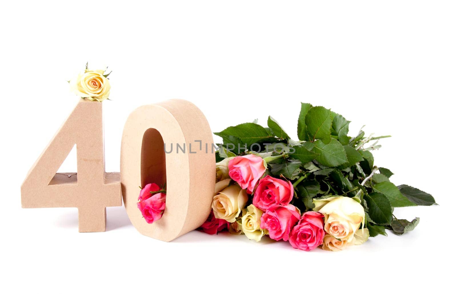 Number of age in a colorful studiosetting,surrounded with roses