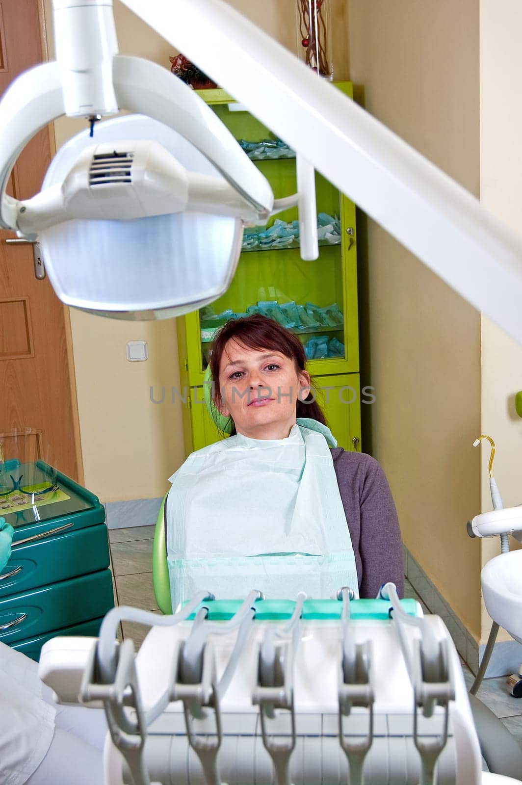 Dental treatment in a young woman in a dentist's office