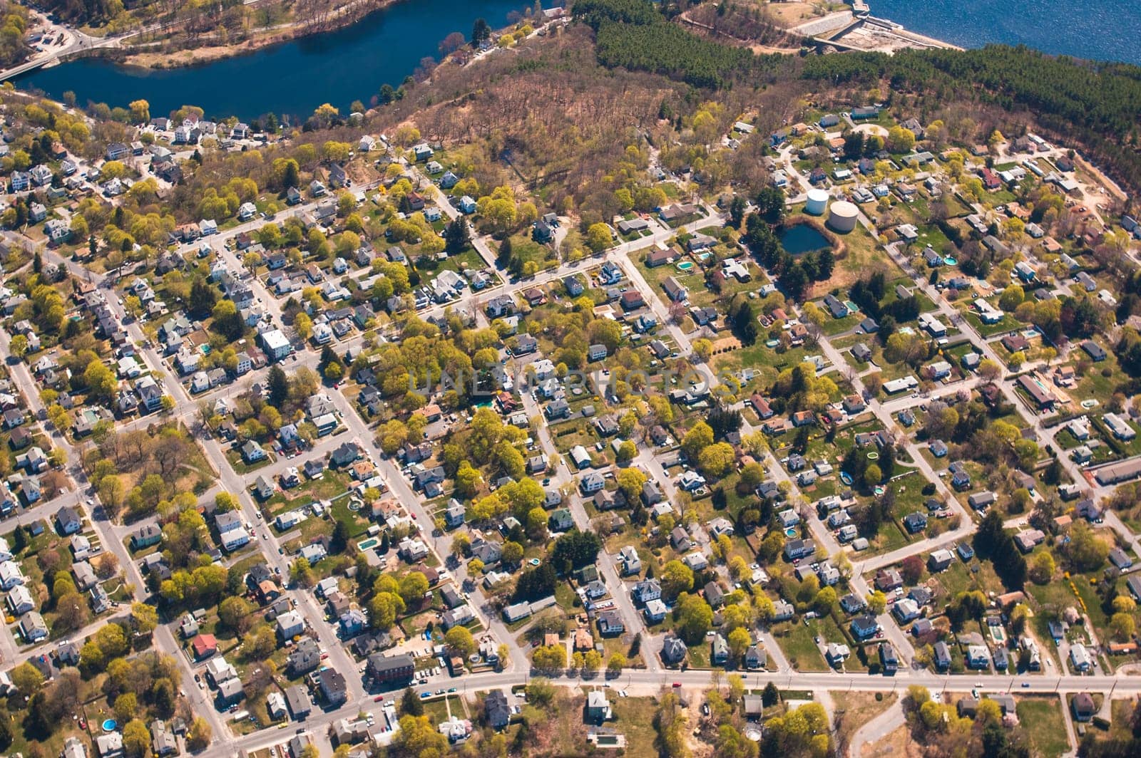 Aerial view of suburban Clinton, Massachusetts and water