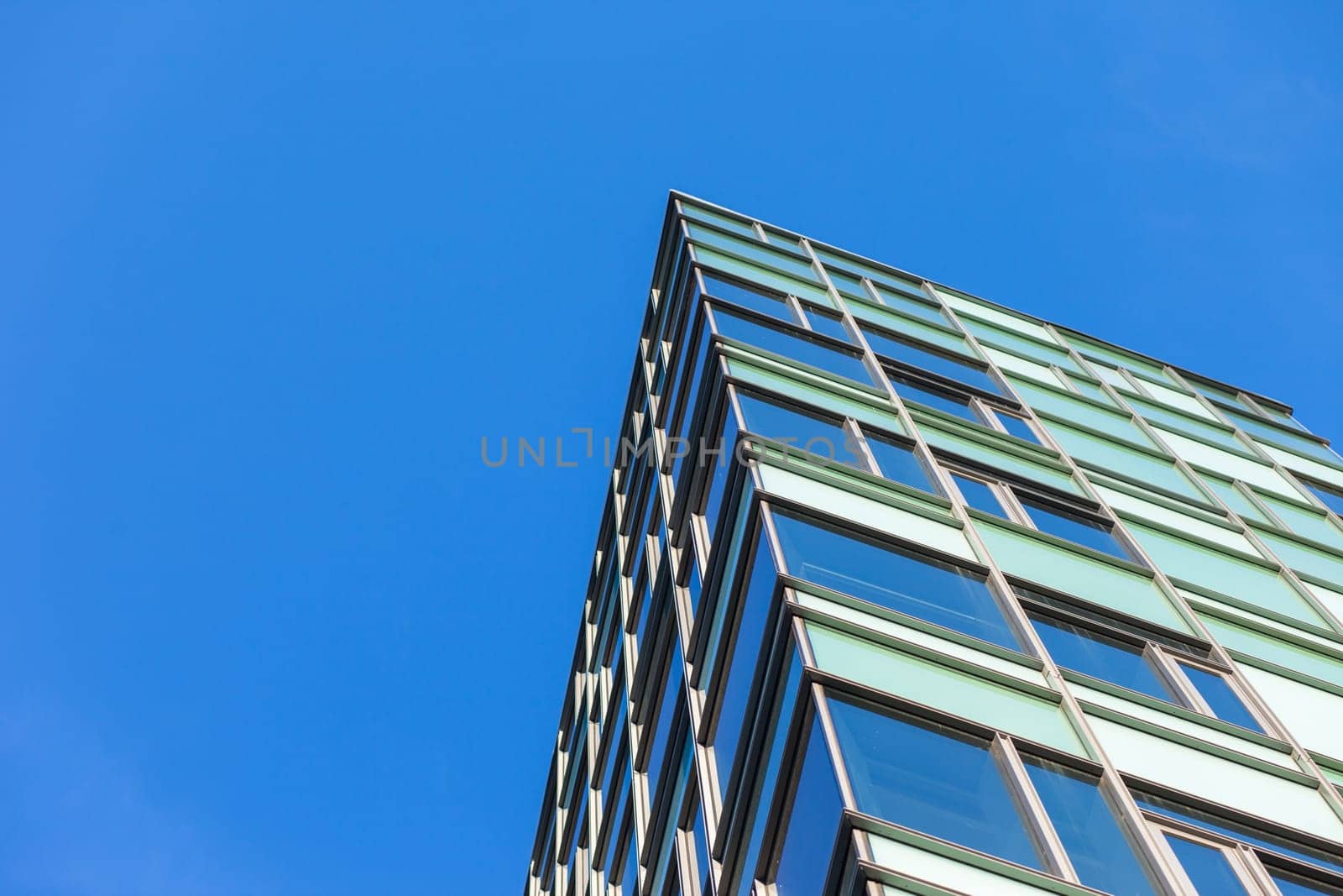 Corner detail of a glass office building