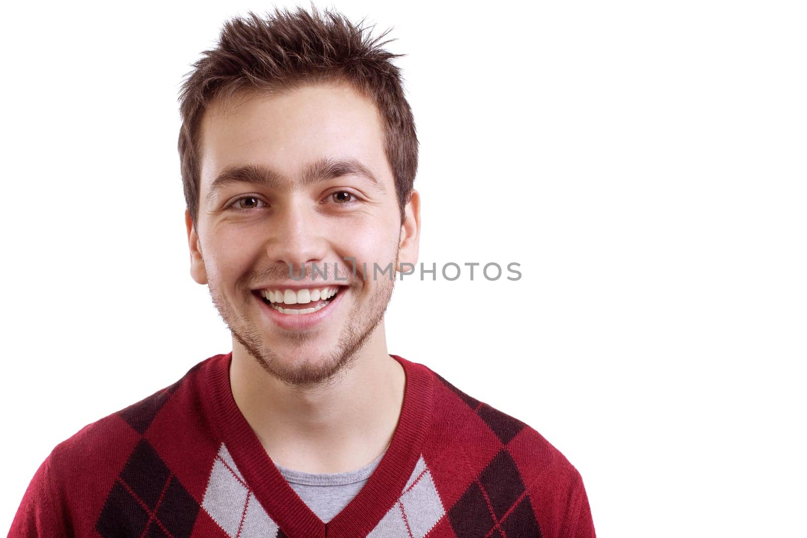 Young man smiling isolated on white background