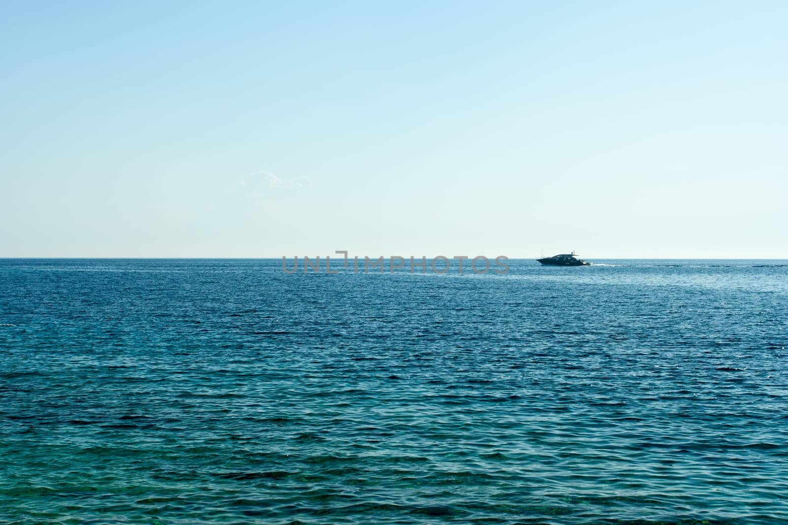 One yacht on open water