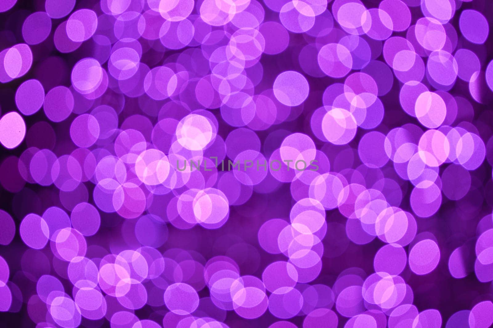 Defocused abstract christmas background, out of focus light spots forming a soft background