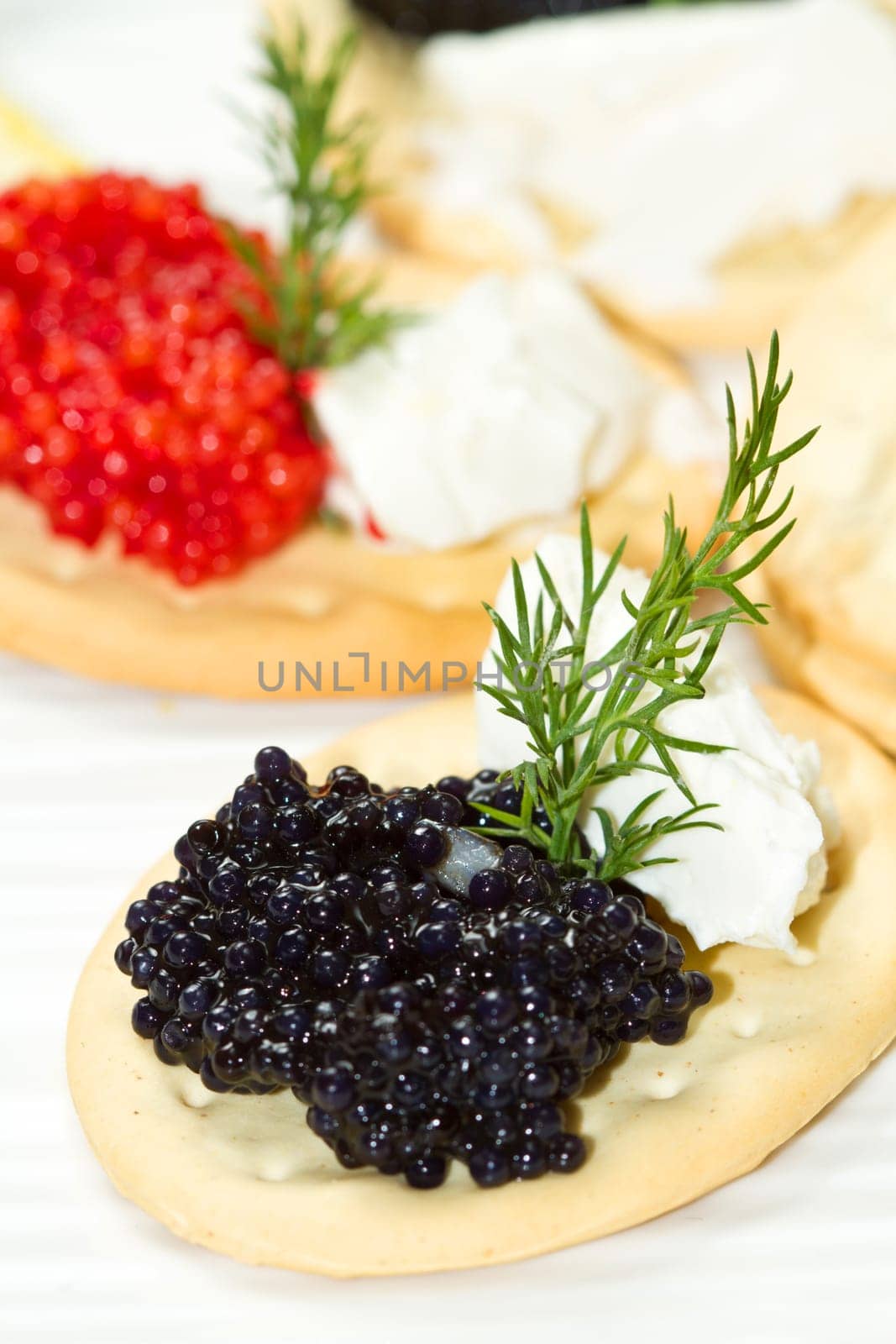 black and red caviar canape