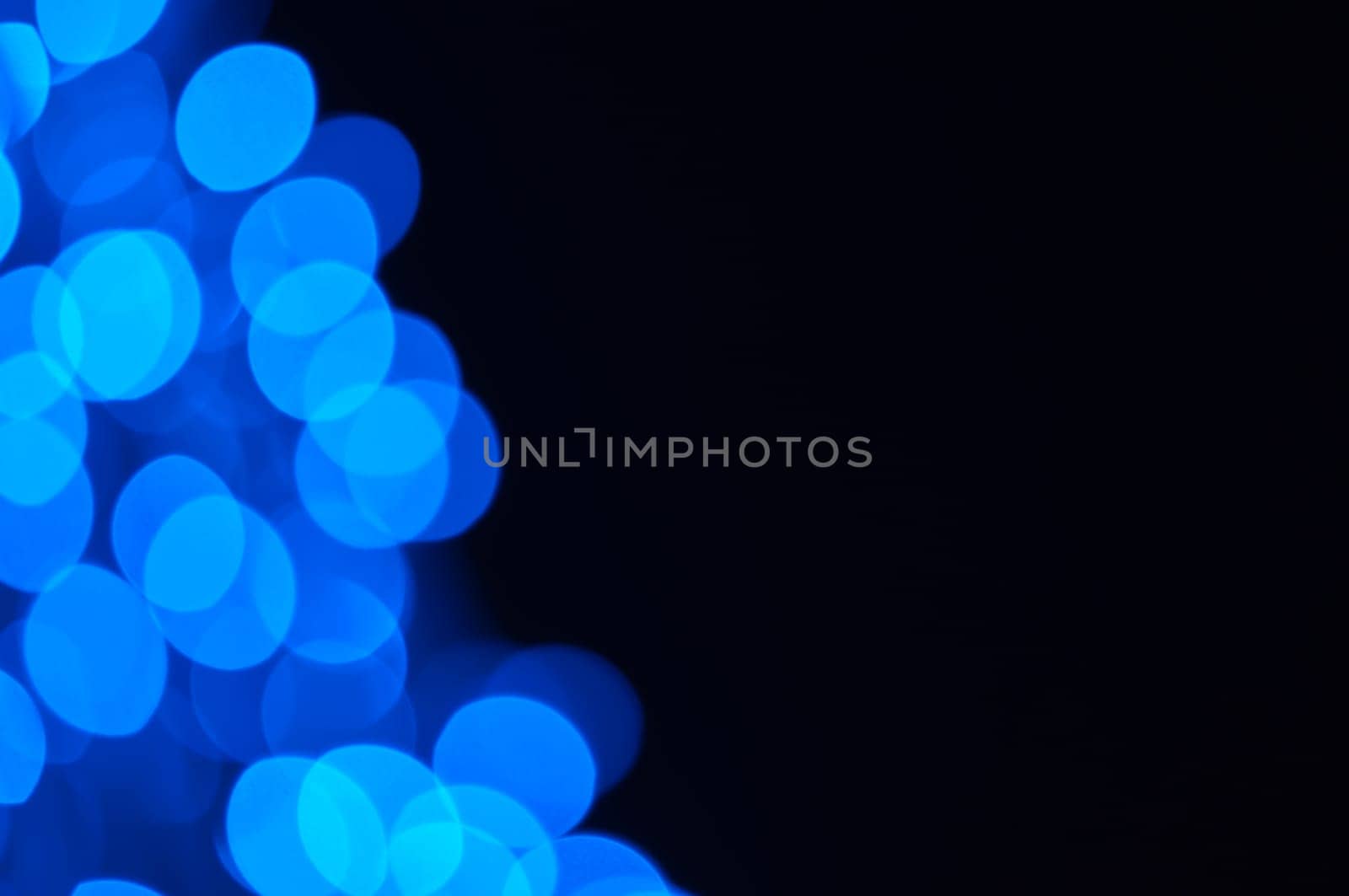 Defocused abstract christmas background, out of focus light spots forming a soft background