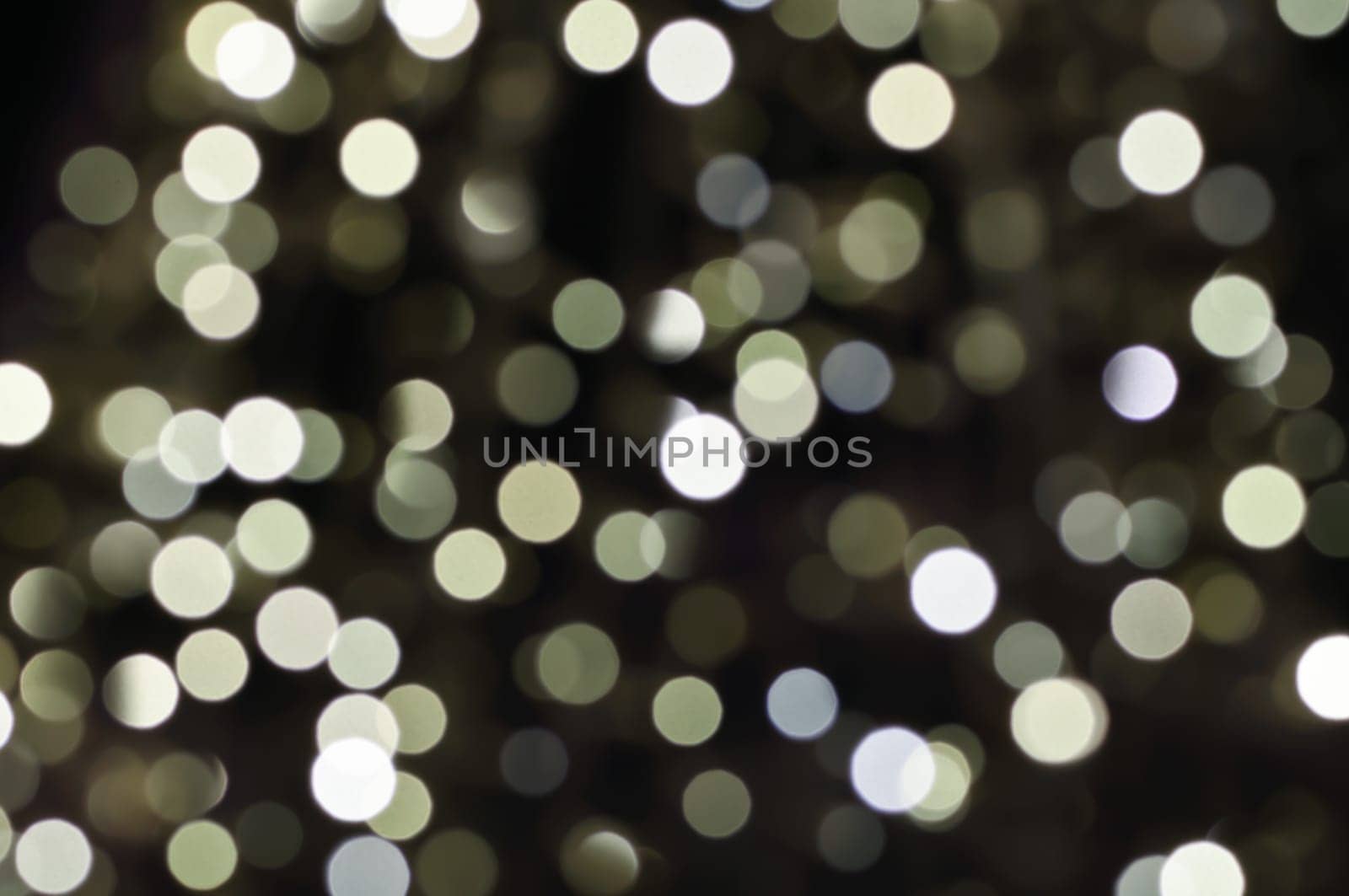 Defocused abstract christmas background, out of focus light spots forming a soft background