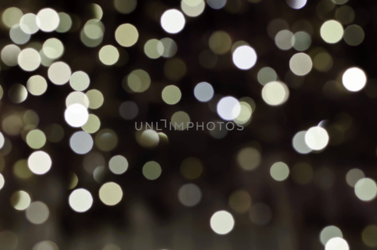 Defocused abstract christmas background, out of focus light spots forming a soft background