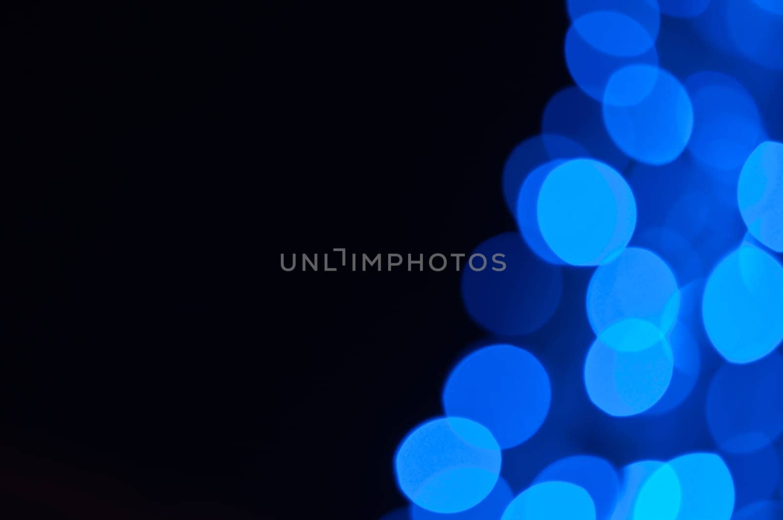 Defocused abstract christmas background, out of focus light spots forming a soft background