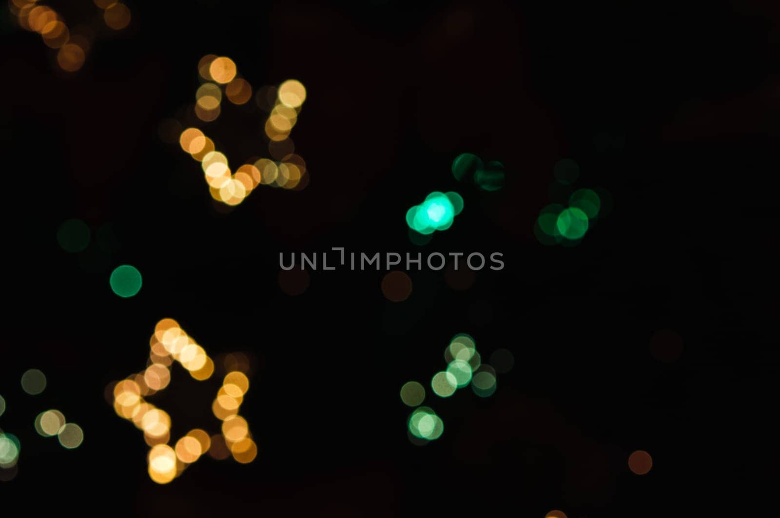 Defocused abstract christmas background, out of focus light spots forming a soft background