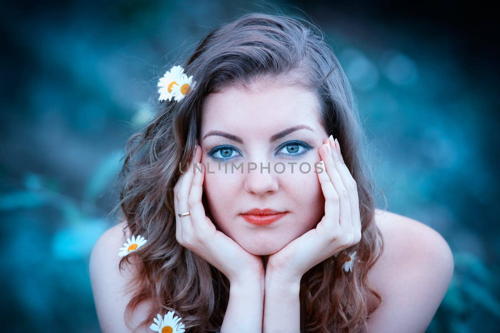 Beautiful young woman romantic portrait outdoor in summer.