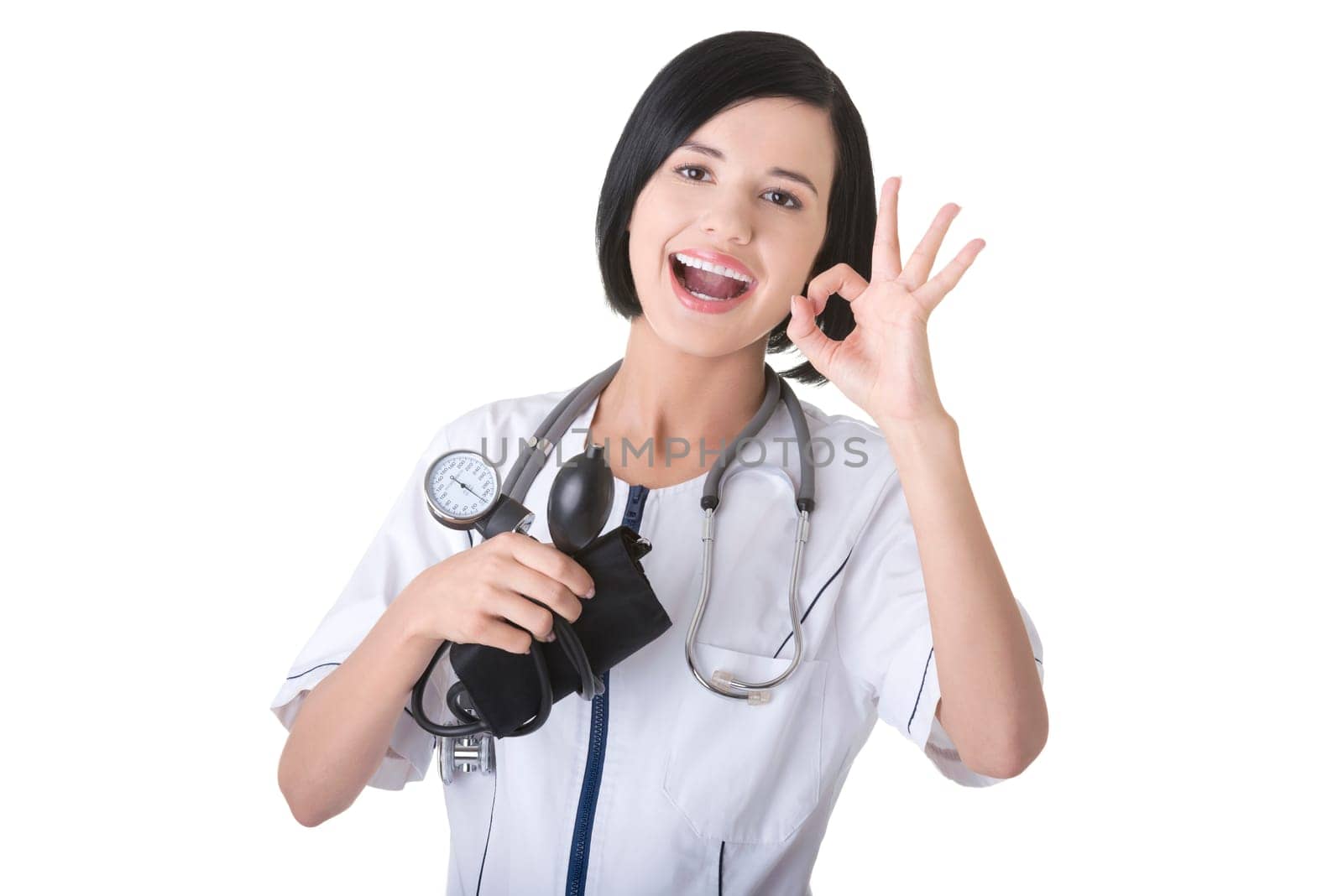 Woman doctor with blood pressure gauge gesturing perfect
