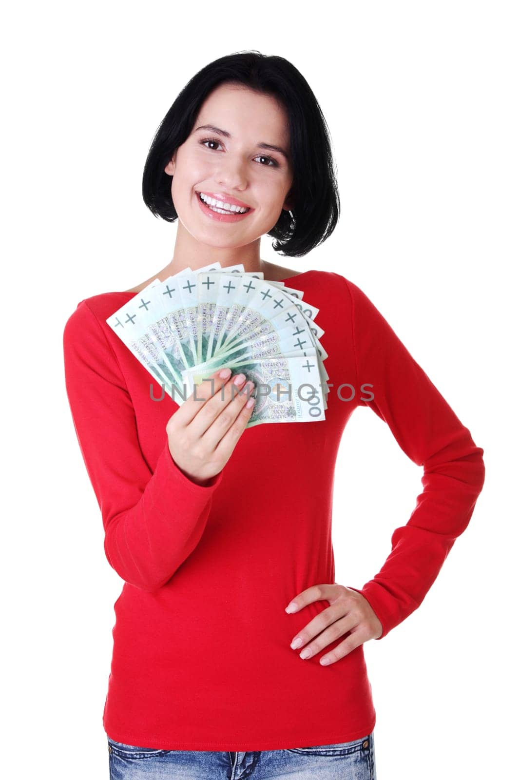 Cheerful young lady holding cash - polish zloty ( pln )