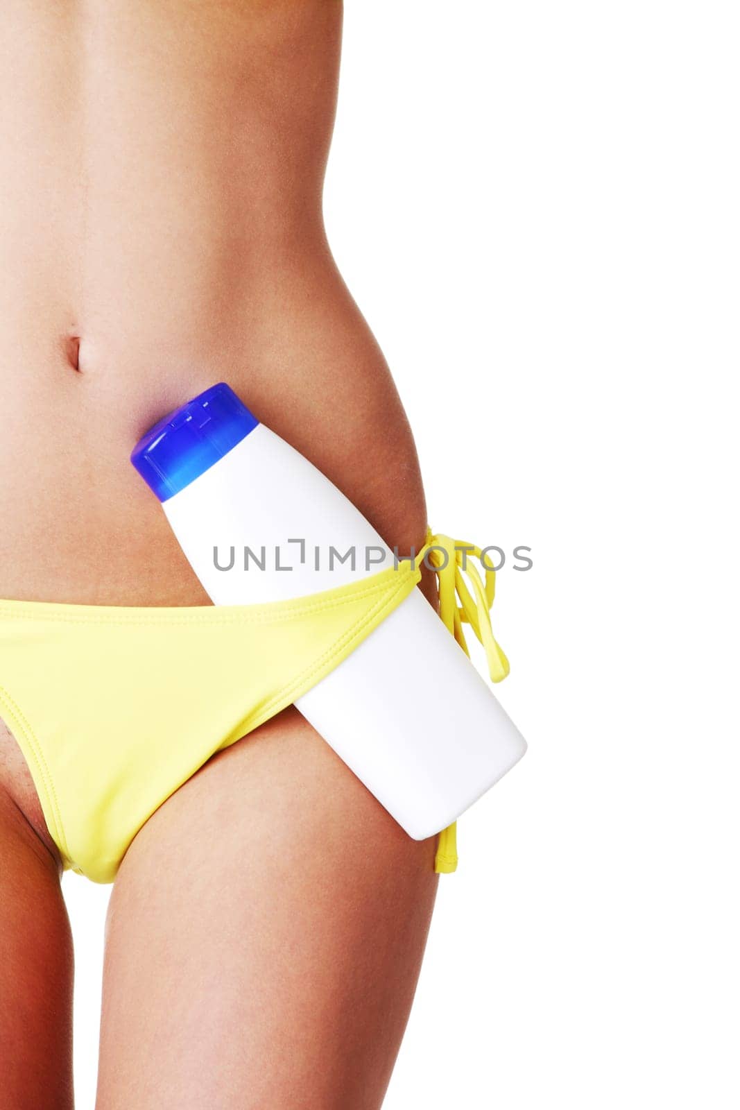 Fit female belly with body lotion