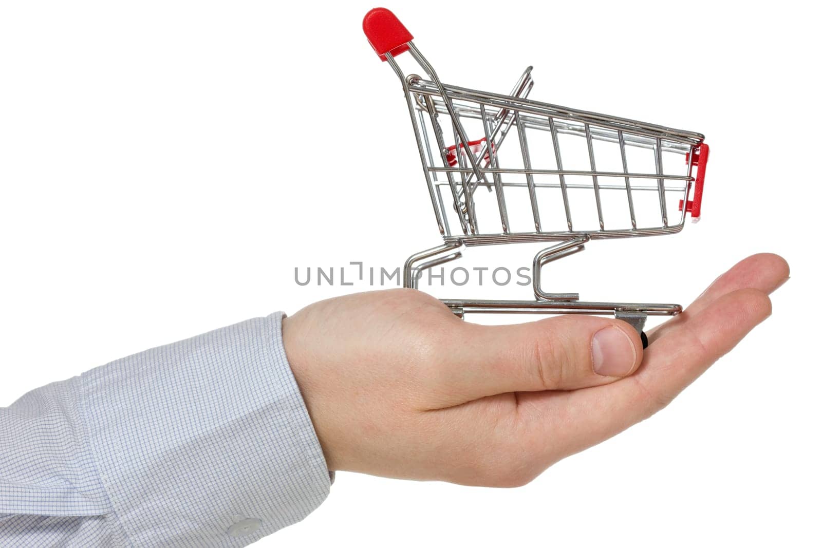 Hand holding shopping cart. Isolated  on white background