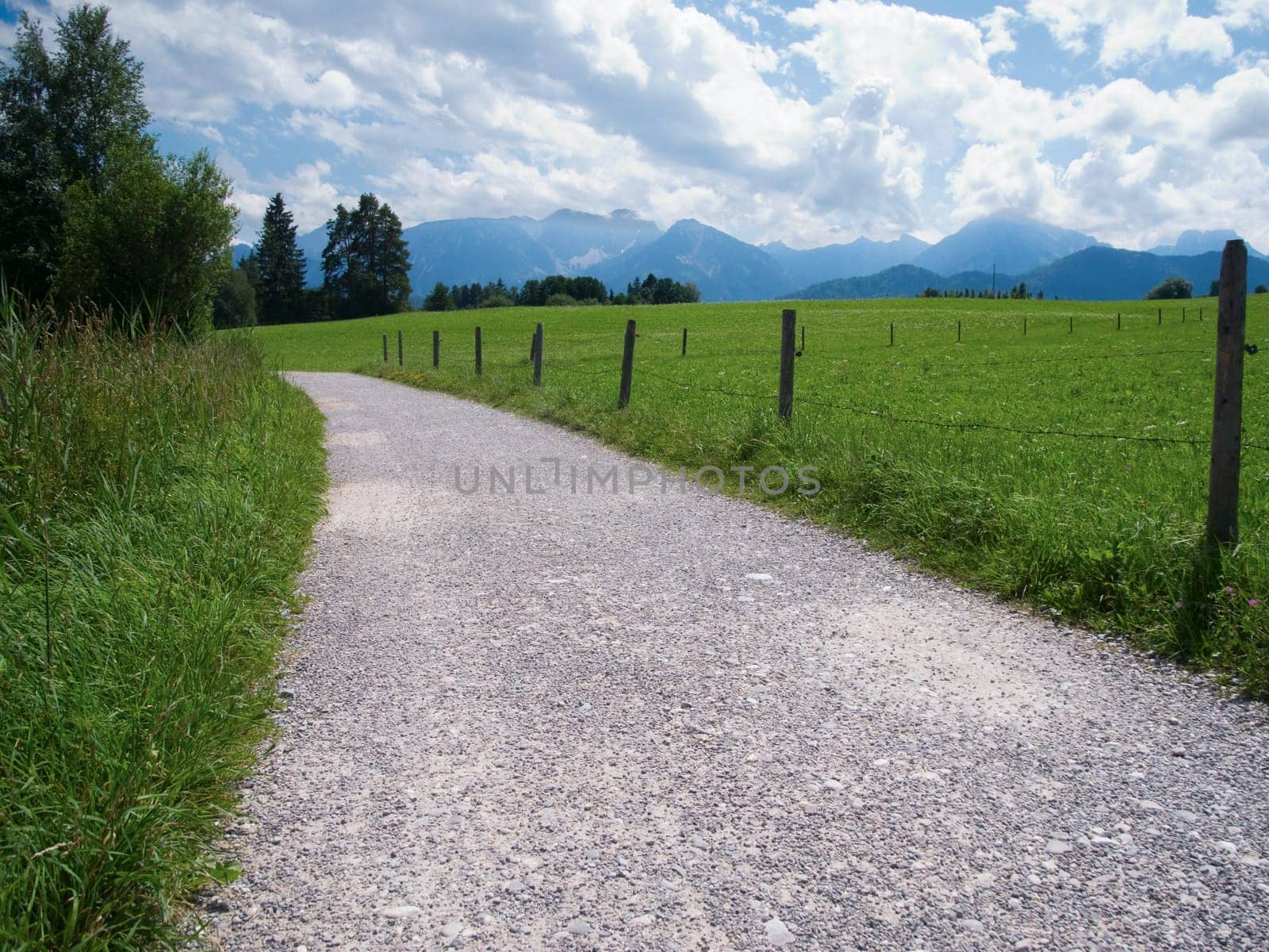 View of the hiking trail around the Hopfensee in the Bavarian Allgäu