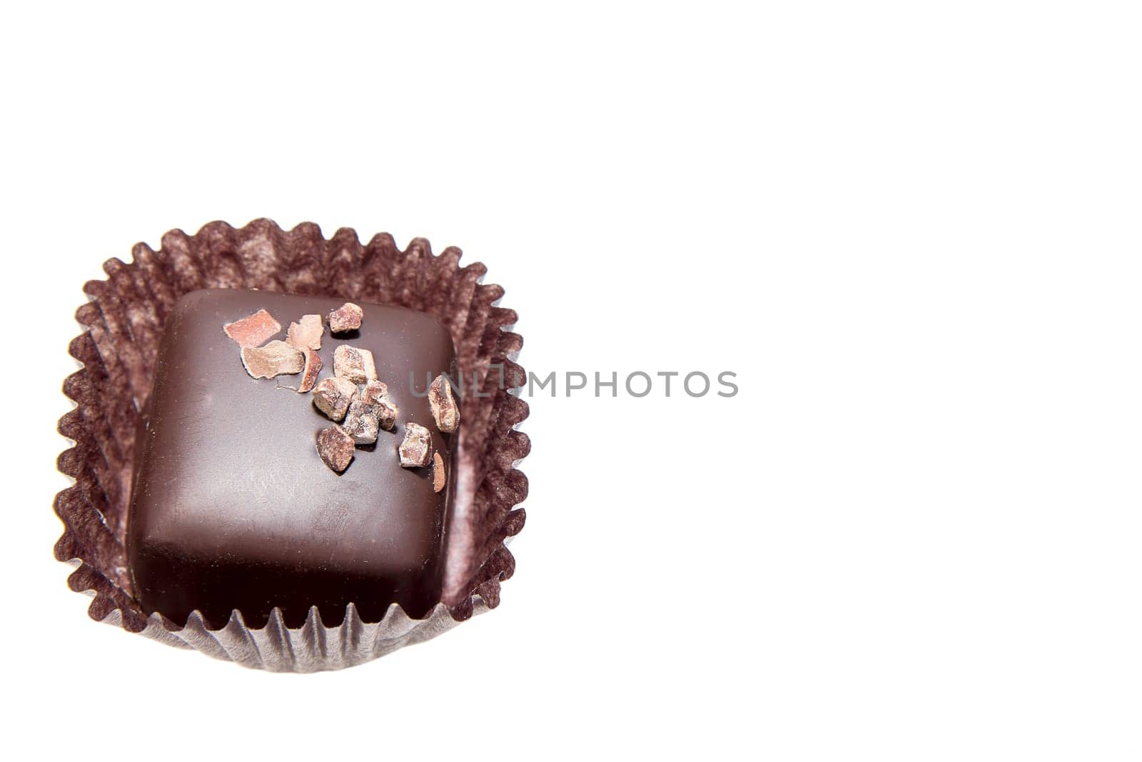 Single Dark Square Chocolate Truffles Isolated on White Background