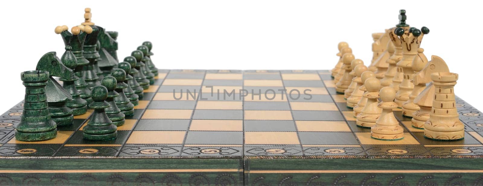 Wooden chess board and pieces (complete), isolated on white.
