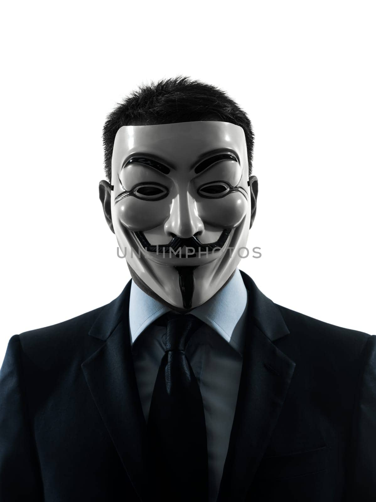 PARIS– OCTOBER 30 : one man dressed and masked as a  member of Anonymous underground group pointing finger on October 30, 2012 in Paris ,France